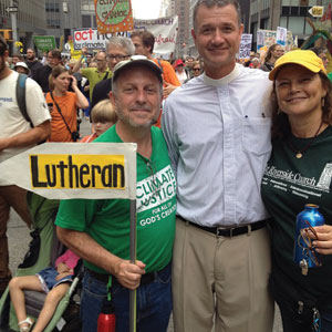In his efforts to save the planet, Pat Almonrode (left), pictured with Fletcher Harper of GreenFaith and Elizabeth Ackerman of Riverside Church in New York, helped organize the People’s Climate March last fall.