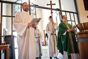 Dan Gleiter/PennLive Chris Pollock (above, left), assisting minister at Good Shepherd Lutheran Church, Harrisburg, Pa.,