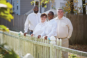 Bob and Kelly Higgs with their two youngest sons, Justin (left) and Christian, whom they adopted through a Lutheran social service organization.