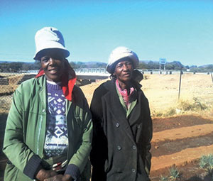 When Basiami Molefe of the ELCB (left) and Gomolemo Molefe of the ELCSA first connected with the MALUDI Garden Project, they did not want to work with each other because they were from different churches. Now they work together to care for people in need in the community. 