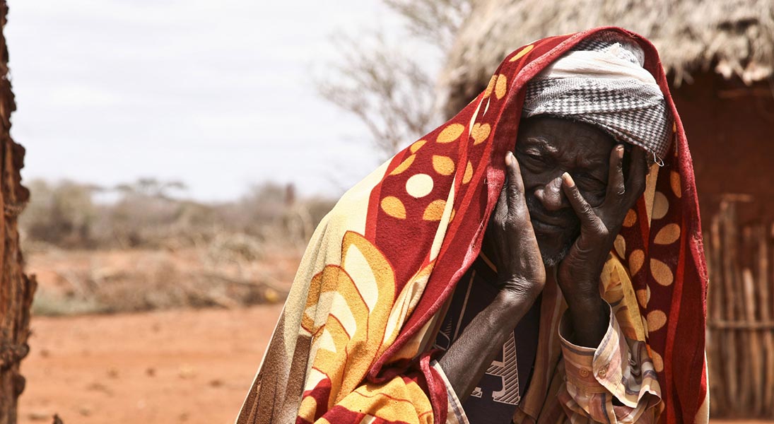 A woman covers her face in anguish at the lack of food and water in the drought-hit Borena region of south Ethiopia. The region experiences the worst drought in 60 years.