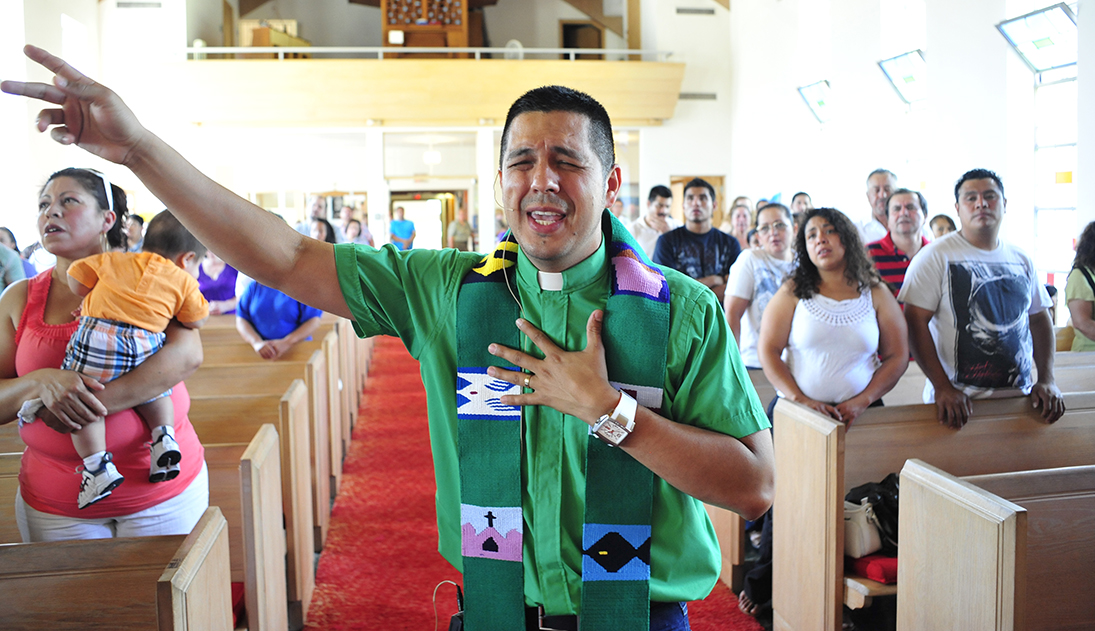 pastor leads worship