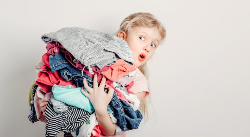 child with clothing donations