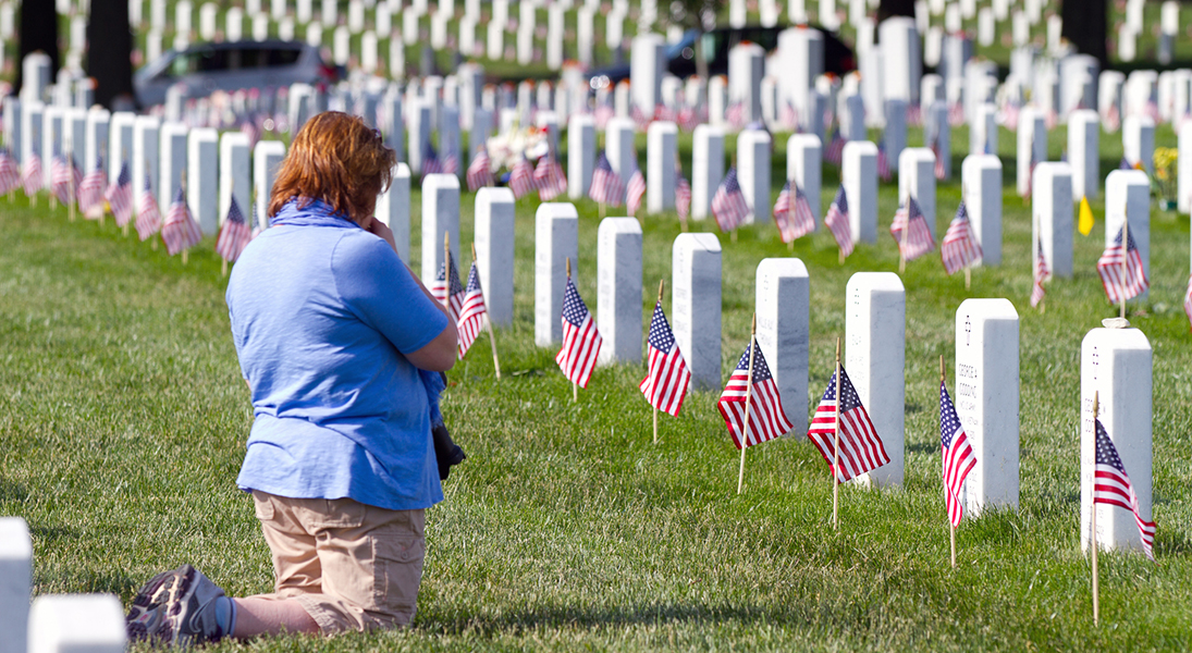 Woman visits veteran's grave