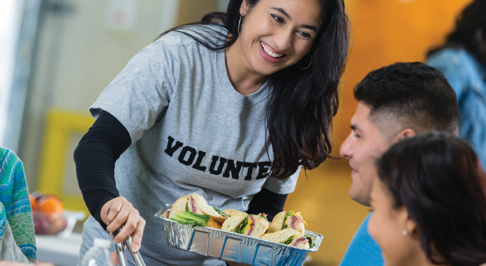 Volunteer serving food