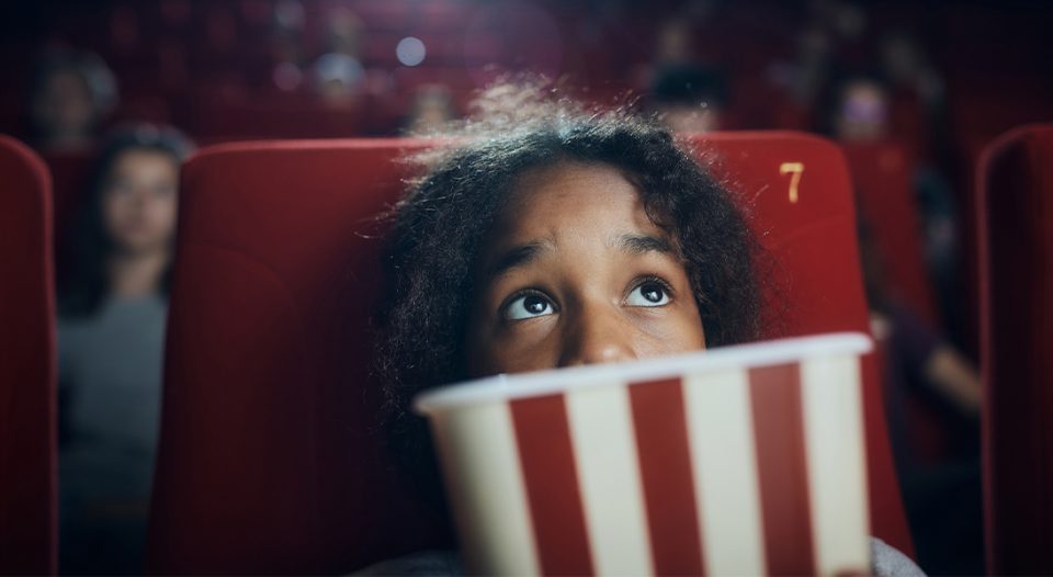 Child in movie theater