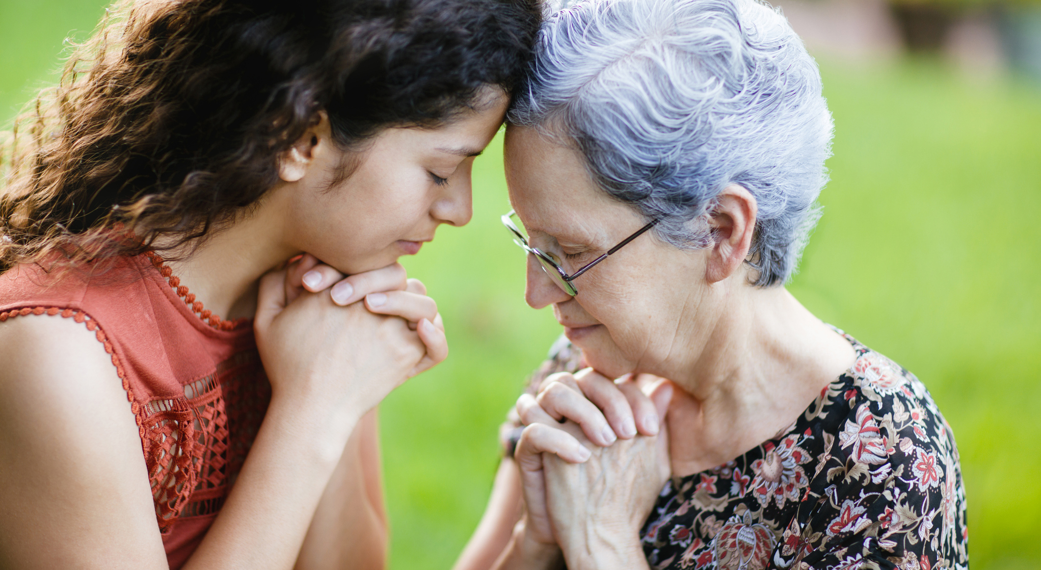 Two women pray