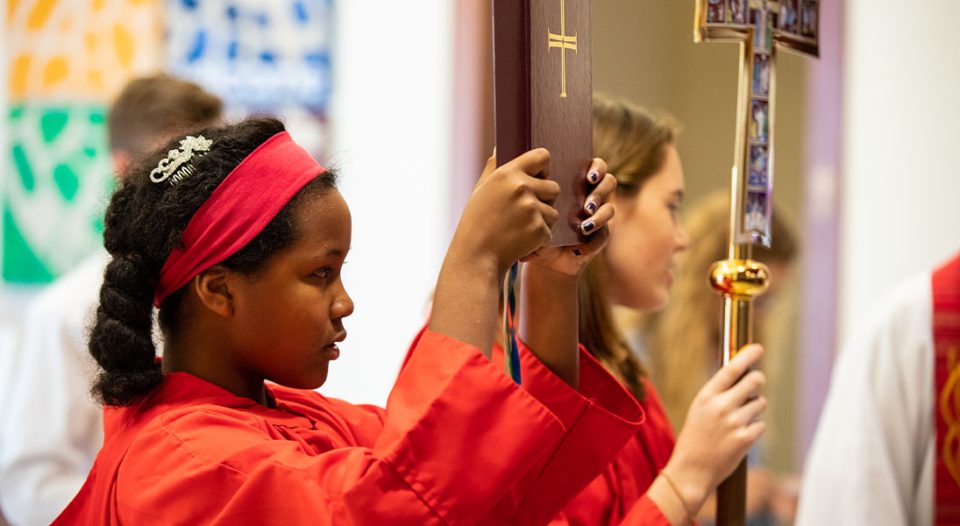 Acolytes serving in worship