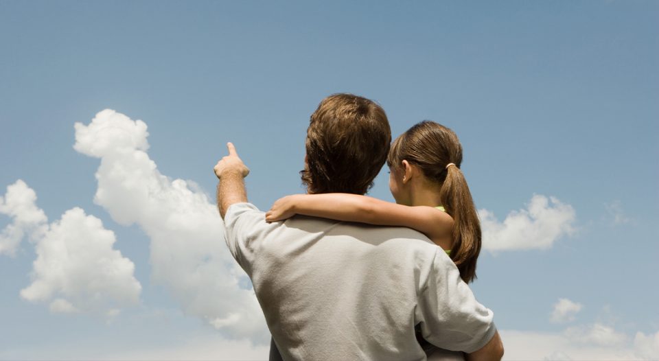 Family looking at the clouds
