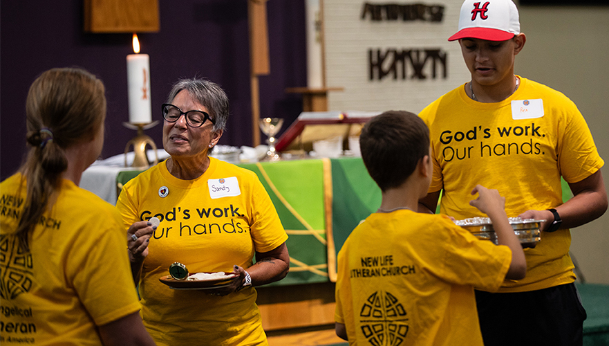 Group of people in God's work. Our Hand's shirts.