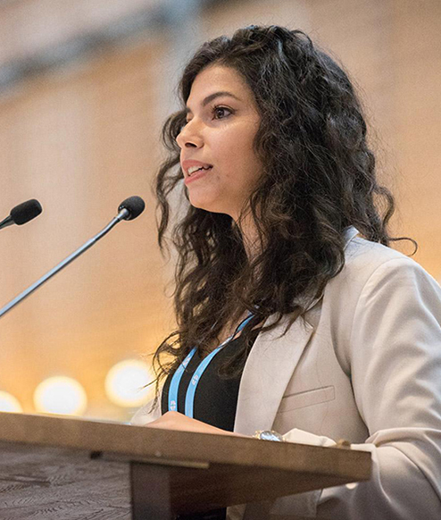 Woman speaking at podium
