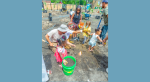 Children work in a community garden