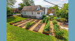 Church building with raised garden beds next to it