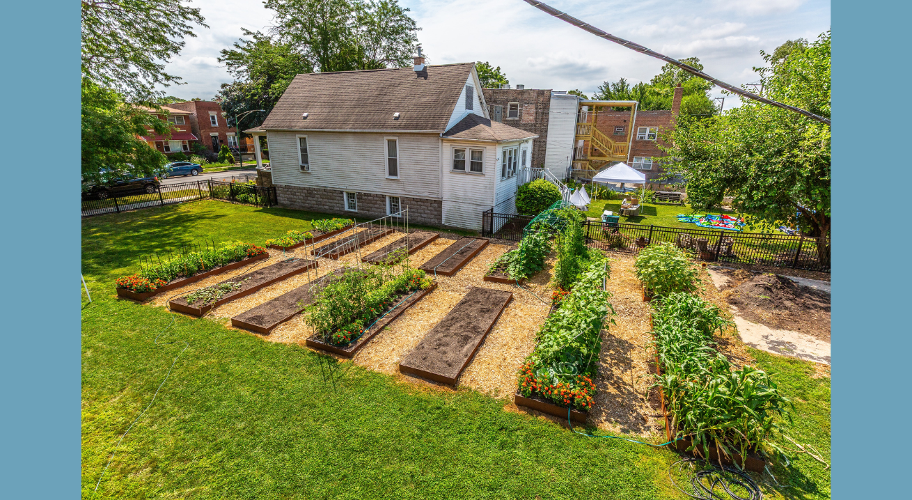 Church building with raised garden beds next to it